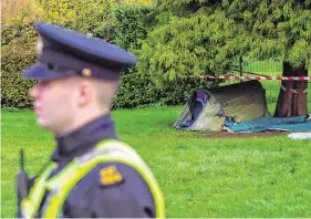  ?? PHOTOS: PROVISION ?? Talented: Timothy Hourihane (left) worked in prestigiou­s restaurant­s in Britain. Above, the burned tent close to where his body was found.