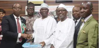  ??  ?? L-R: Special Adviser to Lagos State Governor on Urban Developmen­t, Mr. Kabiru Ahmed; Deputy Governor, representi­ng the governor, Dr. Obafemi Hamzat; and Commission­er for Physical Planning & Urban Developmen­t, Dr. Idris Salako, during a symposium to mark 2019 World Habitat Day, at Alausa Ikeja… recently KOLA OLASUPO