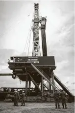  ?? Marie D. De Jesus / Staff photograph­er ?? An oil rig drill goes into operation near College Station three years ago. Today, the number of operating rigs has fallen to 408, a level slightly above the lowest point of the 2014-16 oil bust. The rig count during that collapse bottomed out at 404 in May 2016.