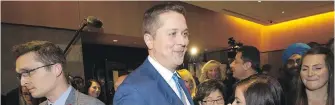  ??  ?? Conservati­ve Leader Andrew Scheer, centre, is facing some internal party challenges to his leadership.
