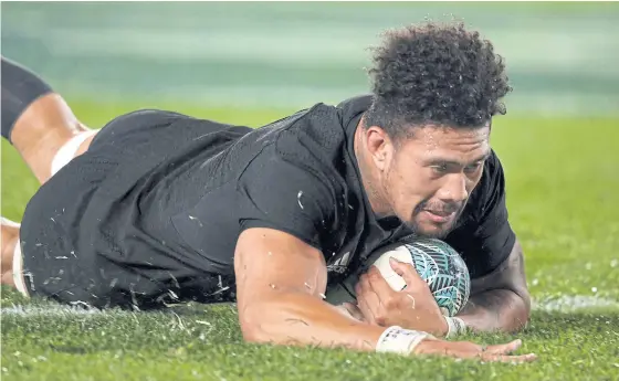  ??  ?? New Zealand’s Ardie Savea scores a try during a match this year.