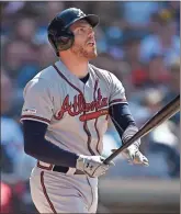  ?? Ap-kelvin Kuo ?? Freddie Freeman and the Braves will open a twogame series against the Kansas City Royals on Tuesday.