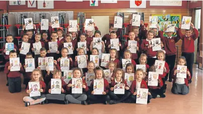  ?? Picture: Dougie Nicolson. ?? Pupils at St Thomas’ RC Primary School in Arbroath show off their entries to The Courier’s Draw Your Mum. Right: some of Arngask Primary’s artwork.