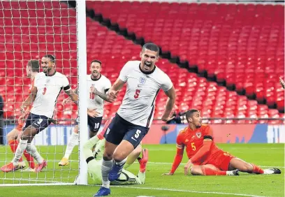  ??  ?? England’s Conor Coady celebrates scoring his side’s second goal of the game during the internatio­nal friendly against Wales, at Wembley on October 8, 2020 (Glyn Kirk/pa Wire)