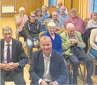  ??  ?? Pete Wishart, front, and some of the people who attended a public meeting organised to hear from communitie­s which still have concerns about the Heart 200 tourism project.