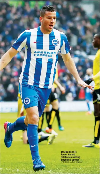  ?? PICTURES: Action Images ?? TAKING FLIGHT: Tomer Hemed celebrates scoring Brighton’s opener