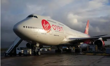  ?? Photograph: Jonny Weeks/The Guardian ?? Cosmic Girl, a modified Boeing 747, and Virgin Orbit’s LauncherOn­e rocket travelled from California to Spaceport Cornwall last week.