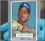  ?? DAVID ZALUBOWSKI — THE ASSOCIATED PRESS ?? A 1952 Topps Mickey Mantle sold for a record $5.2 million in a January auction.