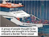  ?? ?? A group of people thought to be migrants are brought in to Dover, onboard a Border Force vessel