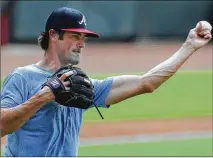  ?? CURTIS COMPTON / COMPTON@AJC. COM ?? Cole Hamels may get his longantici­pated return to the major league mound next week, depending on how his Thursday workout goes, the Braves said.