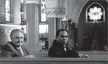  ?? Photo by John Reidy ?? The late Fr Pius Baraik pictured with his Castleisla­nd host, Tom Horan in the Church of Saints Stephen and John during his September 2000 visit.