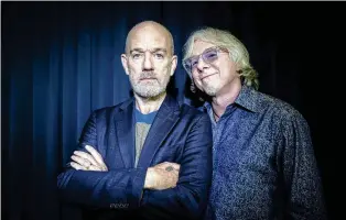  ?? MATT LICARI/INVISION/AP ?? This Oct. 28, 2019 photo shows Michael Stipe and Mike Mills, from R.E.M. posing for a portrait in New York. Twenty-five years ago, R.E.M. released “Up,” the band’s 11th album.