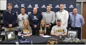  ?? Scott Herpst ?? Among those on hand at Gordon Lee High School to watch senior Kaylee Brown sign on to continue her track career at Kennesaw State University was Leann and Shawn Brown, along with Gordon Lee assistant track coaches Derek Roberts and Trevor Guinn, Gordon Lee head track coach Dan Roberts, Eric Bishop, Gordon Lee principal Michael Langston and Gordon Lee athletic director Todd Windham.