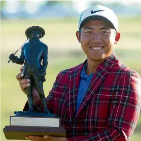  ?? — Reuters ?? Breakthrou­gh: Pan Cheng-tsung posing with the trophy after winning the RBC Heritage tournament for his first PGA Tour victory.
