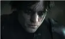  ??  ?? Hero to zero: a glum Robert Pattinson as The Batman. Photograph: AP
