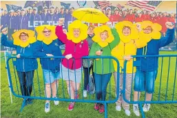  ?? Pictures: Steve MacDougall. ?? Clockwise from top left: Headline act Texas’ lead singer Sharleen Spiteri takes to the stage; capturing the moment for posterity; fans show their colours; ladies from Morlais Castle Golf Club in Merthyr Tydfil; Connor Graham in action.