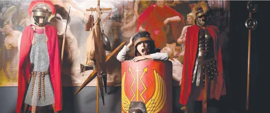  ?? Picture: Evan Morgan ?? Tim Brennan, 6, from Kelso, takes a sneak peek at the touring Ancient Rome exhibition at the Museum of Tropical Queensland.