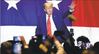  ?? JOHN BAZEMORE AP ?? Former President Donald Trump waves after speaking at the Georgia Republican convention Saturday.