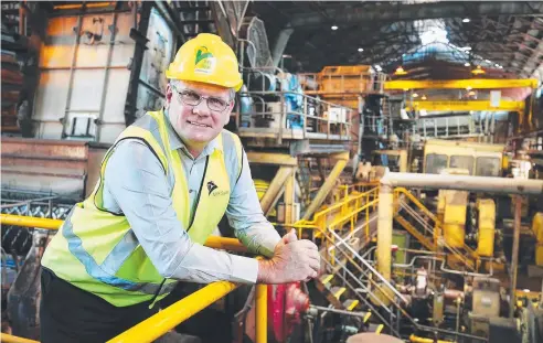  ?? Picture: BRENDAN RADKE ?? TRAINS ALERT: Mulgrave Mill Manager Chris Hoare looks over the crushing machinery ahead of this year's crush.