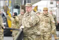  ?? H John Voorhees III / Hearst Connecticu­t Media ?? Members of the state Military Department, in coordinati­on with Danbury Hospital and the city of Danbury, set up a 25- bed mobile field hospital in a parking lot at Danbury Hospital in March.
