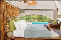  ??  ?? INTIMATE: The safaristyl­e suites and plunge pool at Chena Huts