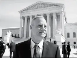  ?? ASSOCIATED PRESS ?? ANDY CILEK STANDS OUTSIDE OF THE SUPREME COURT Wednesday in Washington, where a Minnesota law that bars residents from wearing political clothing at the polls is being debated. Cilek was one of two voters who defied elections officials after he was...