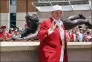  ?? JOHN MINCHILLO — THE ASSOCIATED PRESS ?? Former Cincinnati Reds player Pete Rose smiles as he stands for pictures during the dedication of his statue outside Great American Ballpark prior to a baseball game between the Cincinnati Reds and the Los Angeles Dodgers, Saturday in Cincinnati.