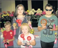  ??  ?? From left, Harry Gamble, Lilli-Grace Gamble, Lucy Gamble and Zade Hextall were among winners of children’s classes at Burbage Gardening Club’s 71st annual open show