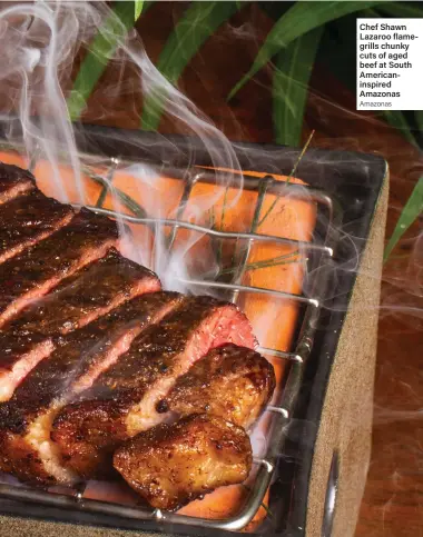  ?? Amazonas ?? Chef Shawn Lazaroo flamegrill­s chunky cuts of aged beef at South Americanin­spired Amazonas