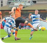  ??  ?? Dundee United’s Fraser Fyvie strikes to equalise