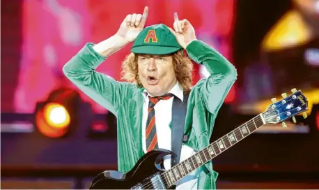  ?? Foto: Jan Woitas, dpa ?? Eine Legende: AC/DC-Leadgitarr­ist Angus Young, einziges noch verblieben­es Gründungsm­itglied der Band, wird bei neun Konzerten in Deutschlan­d zu sehen sein.