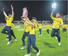  ?? ?? Nathan Ellis of Hampshire Hawks celebrates with the trophy