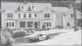  ?? COURANT FILE PHOTO ?? A police car sits outside the New Canaan home of Jennifer Farber Dulos.