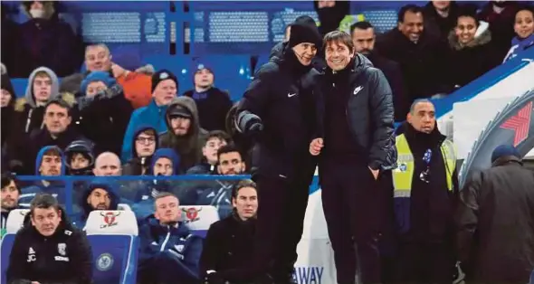  ?? REUTERS PIC ?? Chelsea manager Antonio Conte talks with the fourth official during their Premier League match against West Bromwich Albion on Monday.