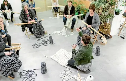  ?? PHOTO: SUPPLIED ?? Jacinta Stevenson demonstrat­es plus-sized knitting, using oversized metre-long knitting needles and felted yarn.