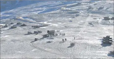  ?? INDIAN ARMY/REUTERS ?? Disengagem­ent process between the Indian Army and China's PLA in the eastern Ladakh region.