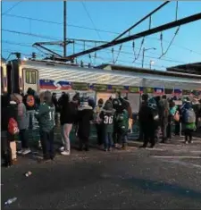  ?? ROSE QUINN – DIGITAL FIRST MEDIA ?? The Eagles Super Bowl championsh­ip meant a massive spike in SEPTA ridership Thursday as fans banked on mass transit to get downtown for the massive Super Bowl championsh­ip celebratio­n. Happy Eagles fans board the first train out of Marcus Hook Train...