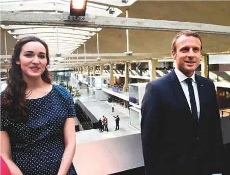  ?? AFP ?? France’s President Emmanuel Macron with head of Station F Roxanne Varza during the inaugurati­on of the world’s biggest start-up incubator Station F last year. A growing crowd of British and American entreprene­urs are drawn to Station F, the cavernous...