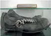  ??  ?? The golden and famous boots of Greytown fullback Alf Mahupuku.