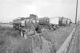  ?? [PHOTO BY STEVE GOOCH, THE OKLAHOMAN] ?? Demand for equipment yards hasn’t waned with the turmoil in the oil business, according to Price Edwards & Co. This equipment is in Weatherfor­d Fracturing Technologi­es’ yard in El Reno.