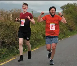  ??  ?? Eamon O’Connor and Seán McGillicud­dy, who organises the Listowel branch of Hope Guatemala, on the road to Árd a’ Bhóthar.