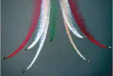  ?? — AFP ?? An aerobatic team performs during celebratio­ns to mark the country’s Independen­ce Day in Islamabad.