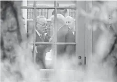  ?? ALEX WONG, GETTY IMAGES ?? Senate Democratic leader Chuck Schumer and President Trump in the Oval Office on Wednesday.