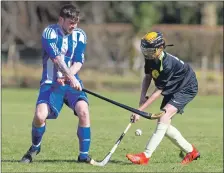  ?? Photograph Stephen Lawson. ?? Charlie Ferguson, Strachur-Dunoon, and Ewan Donnan, Inveraray, in action in the Highland Industrial Supplies Sutherland Cup first round tie last Saturday.