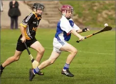  ??  ?? Oisín Rochford of Ballyhogue displays neat control as he races away from Dylan Hersey-Kenny (Ballygarre­tt).