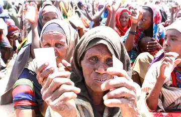  ??  ?? Almost 400,000 famine victims who fled to the Mogadishu for aid at the height of famine, are still living in one of the many refugee camps outside Mogadishu. — Tengri News photo