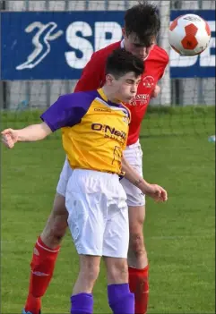  ??  ?? Cillian Gilligan of Wexford puts pressure on Cork’s Ethan Hurley.