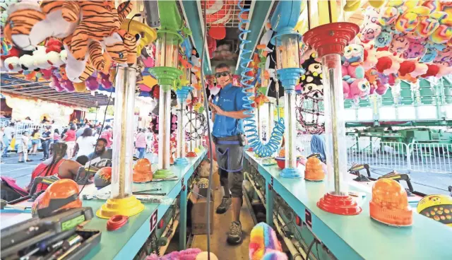  ?? JOE RONDONE/THE COMMERCIAL APPEAL ?? Opening day of the Mid-south Fair at the Landers Center in Desoto County, Mississipp­i, on Sept. 20, 2018.