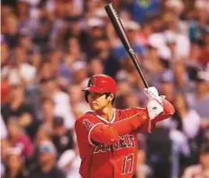  ?? AFP ?? Pinch-hitter Shohei Ohtani (17) of Los Angeles Angels bats against Colorado Rockies on Tuesday.