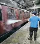  ??  ?? Cleaning coaches for thethree reopening trains inthe carriage shed at Kiddermins­ter.
KENNY FELSTEAD/ SVR